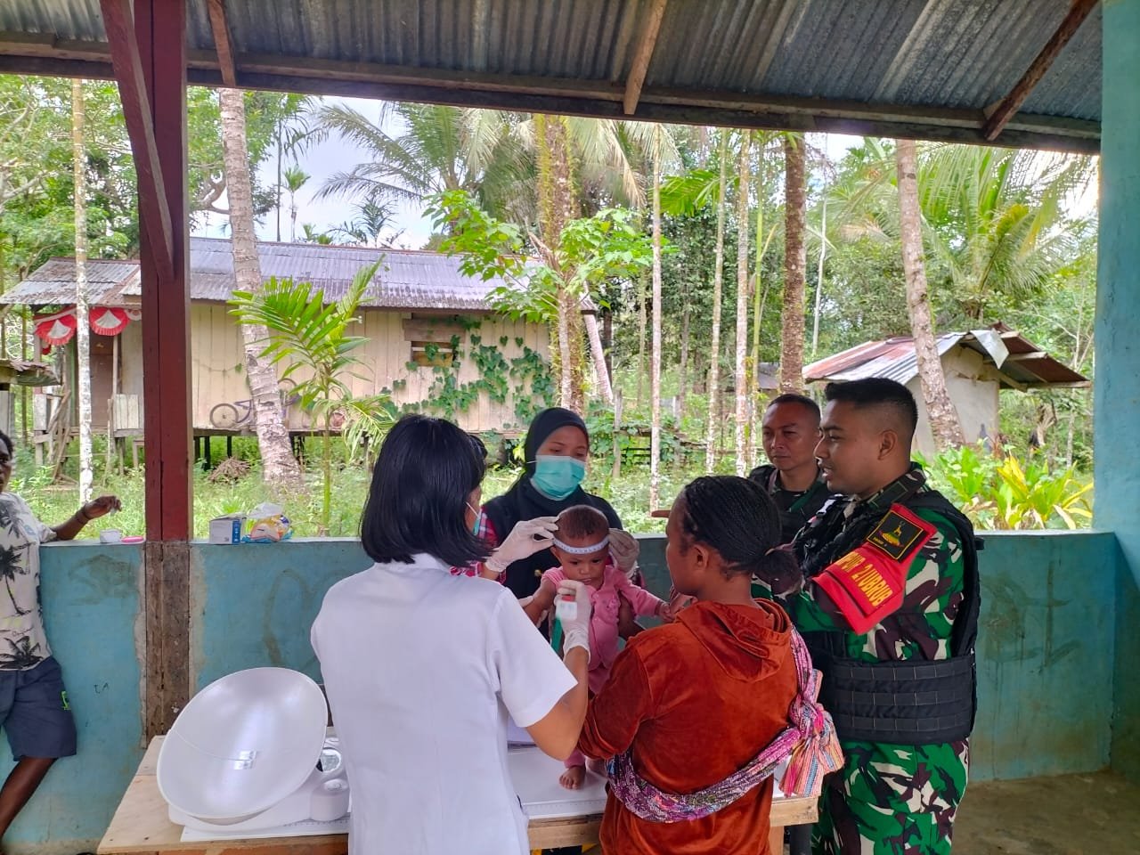 Pantau Tumbuh Kembang Anak Sejak Dini, Satgas Yonif 310/KK Gelar Posyandu Di Perbatasan 1 WhatsApp Image 2024 07 27 at 10.36.52 2af8de17