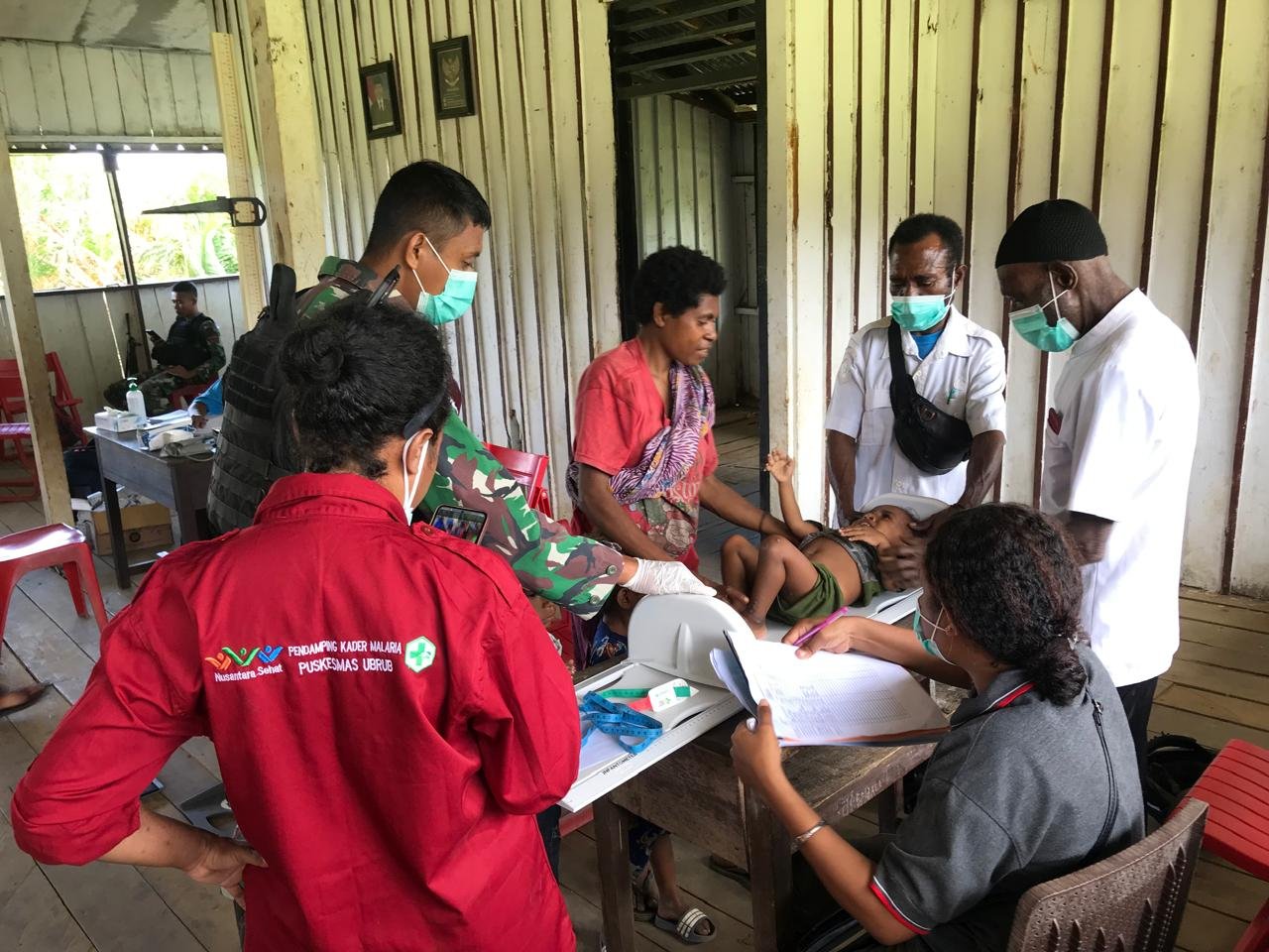 Bersinergi Tingkatkan Kualitas Kesehatan Di Perbatasan RI-PNG, Satgas Yonif 310/KK Gelar Posyandu 10 WhatsApp Image 2024 09 05 at 07.42.10