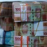 KPK: Gubernur Bengkulu Rohidin Mersyah Diduga Mencairkan Gaji Guru Honorer untuk Dana Pemenangan Pilgub 2 ilustrasi mata uang rupiah 5 169